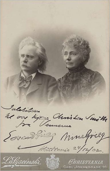 What is the name of the professional choir named after Grieg?