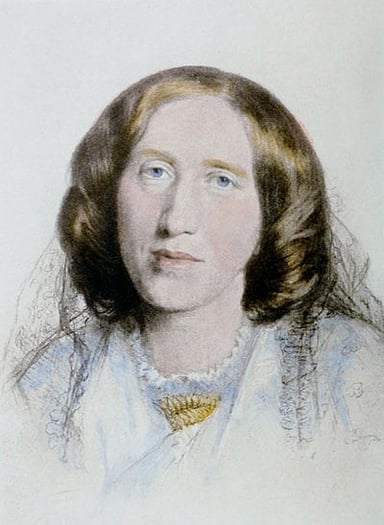Who compared George Eliot's novels to those of Charles Dickens and Thomas Hardy?
