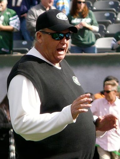 Who was the head coach that brought Rex Ryan to the Ravens?