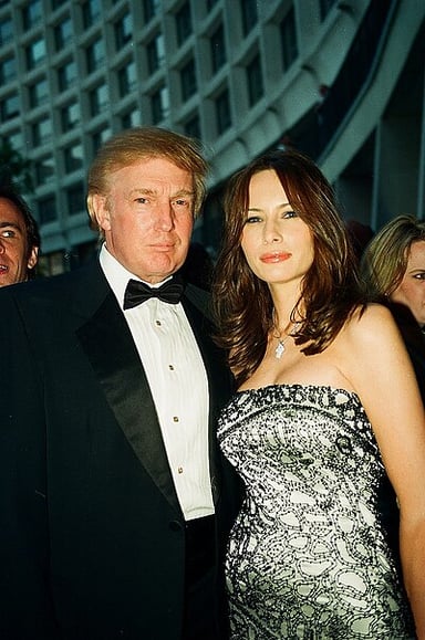 In which city did Melania Trump move to in 1996?
