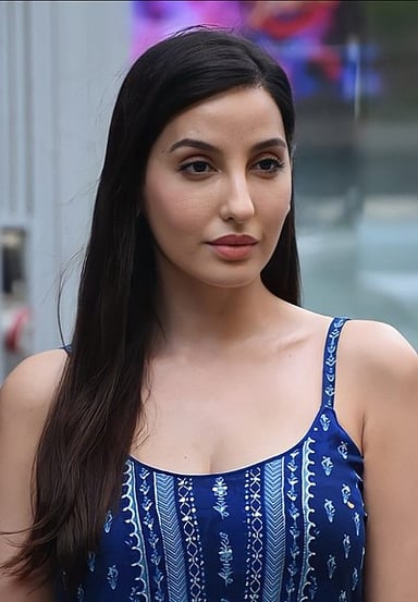 In which industry is Nora Fatehi known for her work?