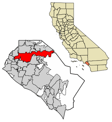 What is the name of the industrial district located north of the Riverside Freeway and east of the Orange Freeway in Anaheim?