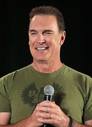Which character did Patrick Warburton portray in a sitcom about a group of friends?