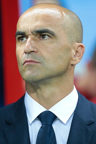 What is the nationality of Roberto Martínez?