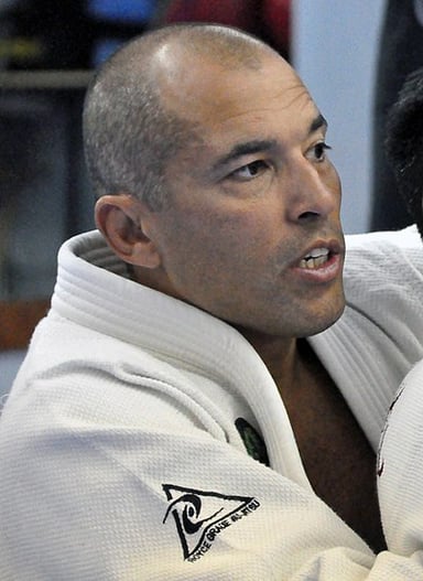 Who inducted Royce Gracie into the UFC Hall of Fame in 2003 alongside him?