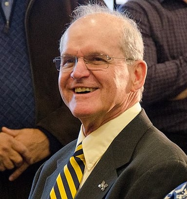Other than coaching, what was Jack Harbaugh's role in football?