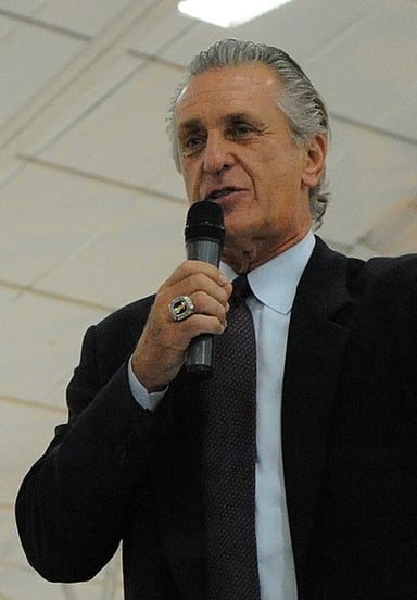 Which university did Pat Riley attend and play basketball for?