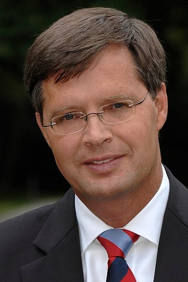 What is Balkenende's academic background in?