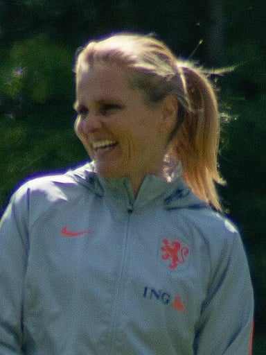 Who is the current head coach of the England women's national football team?
