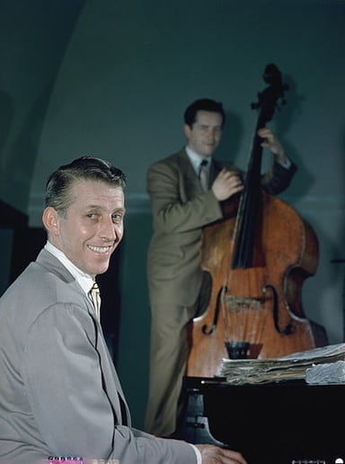 What genre of music is Stan Kenton primarily associated with?