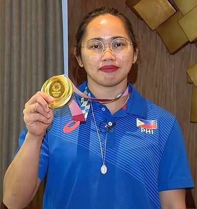 What record did Hidilyn set in clean and jerk?
