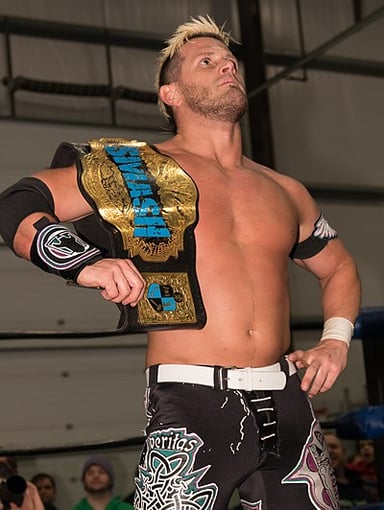 How many times has Alex Shelley won the Impact World Champion title?