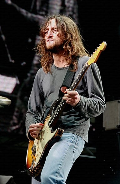 What was the first album Frusciante appeared on with the Chili Peppers?