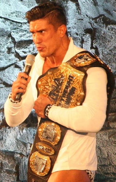Which championship did EC3 hold when he was signed with the National Wrestling Alliance?