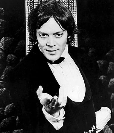 Which character did Raul Julia play in the film Romero?