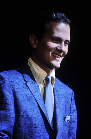 What genre of music was Pat Boone notably successful in?