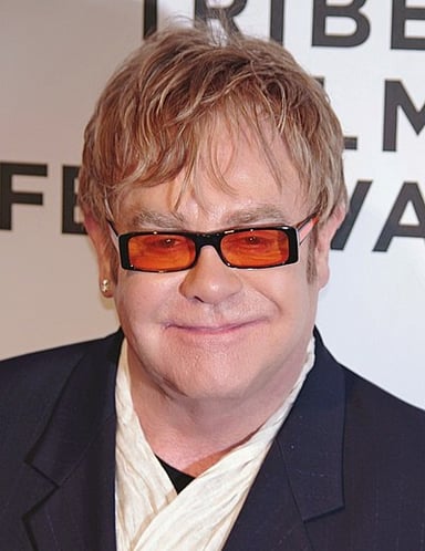 Which events has Elton John attended or competed in?[br](Select 2 answers)