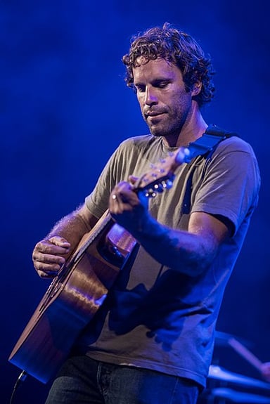What profession did Jack Johnson have before becoming a singer-songwriter?