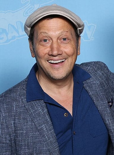 How is Rob Schneider related to John Schneider, star of "The Dukes of Hazzard"?