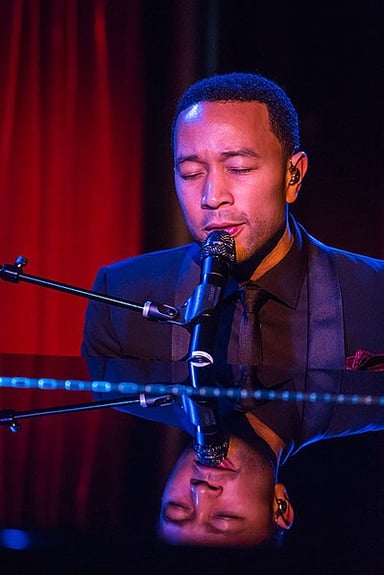 Who did John Legend succeed as'senior coach' on The Voice?