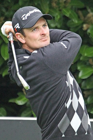 In what year did Justin Rose first reach number one in the world?