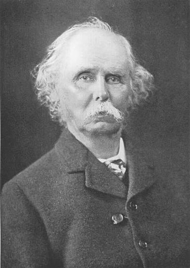 What famous economics textbook did Alfred Marshall author?