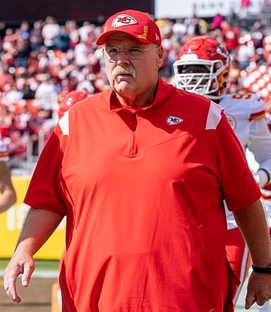 What is the city or country of Andy Reid's birth?