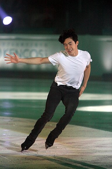 Nathan Chen is the first Asian American man to win which titles?