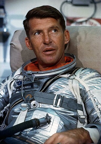 How many times did Schirra travel into space?