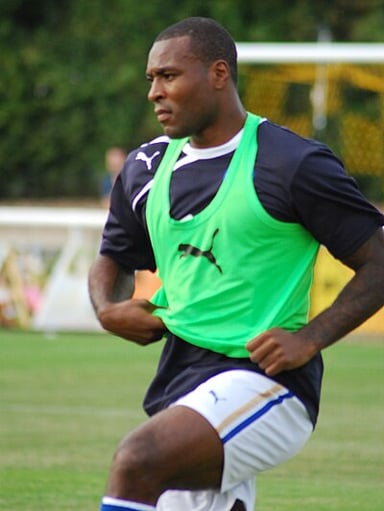 For which club did Wes Morgan begin his professional career?