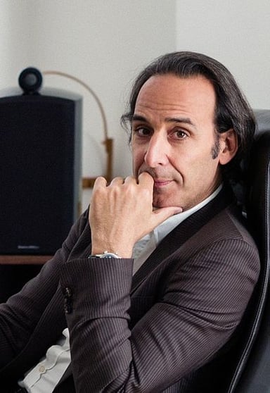 Which Alexandre Desplat-scored film features a military manhunt in the Middle East?