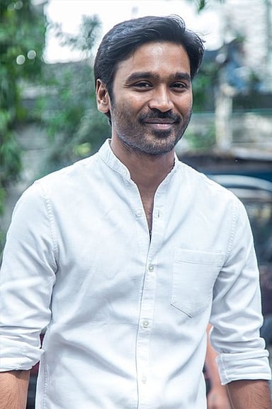 What was Dhanush's first film?