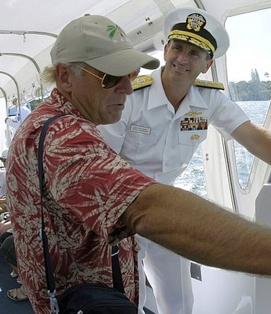 Which restaurant chain co-developed by Jimmy Buffett is now defunct?