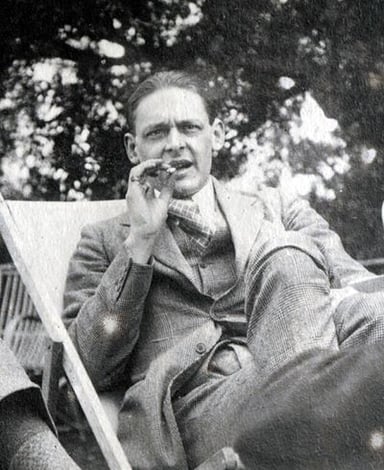 What was T.S. Eliot's occupation before becoming a full-time writer?