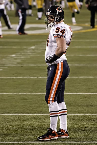 Did Urlacher ever win a Walter Payton NFL Man of the Year award?
