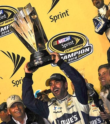 For which team did Jimmie Johnson compete in the IndyCar Series?