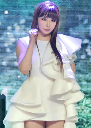 What was Park Bom's debut solo single?