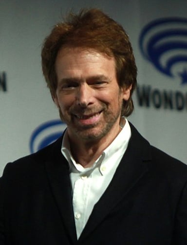Bruckheimer worked with which actor in both "The Rock" and "Armageddon"?