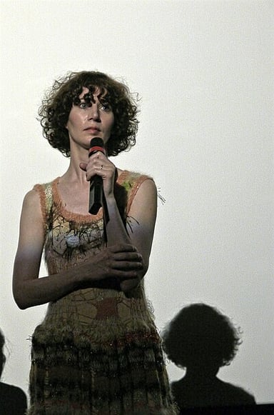 What does Miranda July's work typically encompass? 