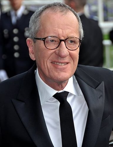 What type of tale is Geoffrey Rush associated with in his role in Finding Nemo?