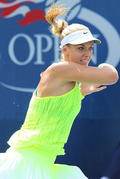 Who was Lisicki's partner when she won the 2014 Miami Open?