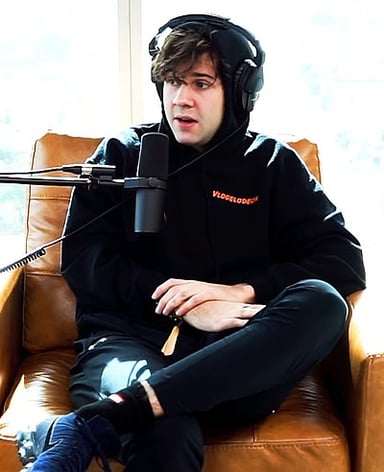 In which reality competition TV show did David Dobrik serve as a host?