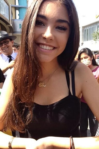 Which celebrity posted a link to one of Madison Beer's covers, boosting her fame?