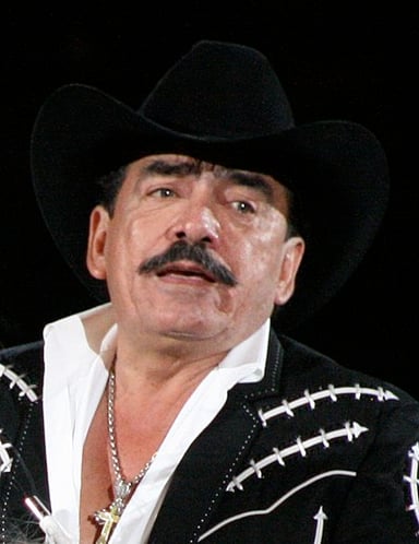 How many number-one albums did Joan Sebastian have on the Billboard Top Latin Albums chart at the time of his death?