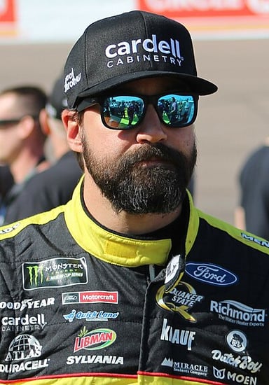 Which team did Paul Menard drive for in 2005 and 2006?