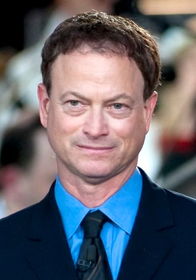 What is the name of the band Gary Sinise founded?