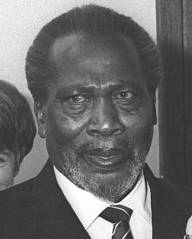 What was the name of the 1945 event Jomo Kenyatta co-organized in Manchester?