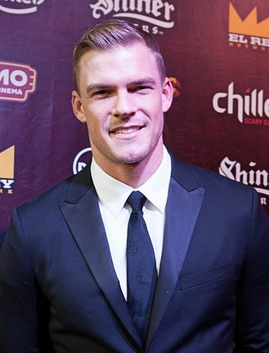 As a model, what iconic brand did Alan Ritchson work for?