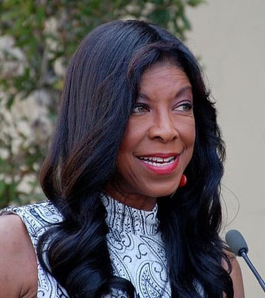 Who was Natalie Cole's famous father?