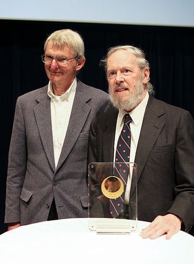 Which prestigious award did Dennis Ritchie receive in 1983?